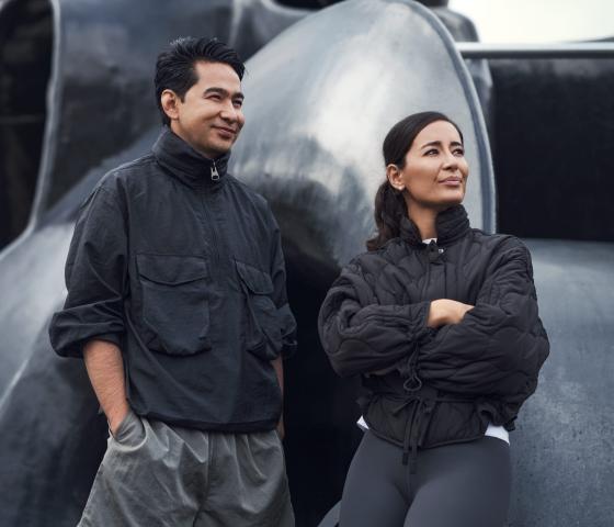 Two AFRY employees photographed in urban environments