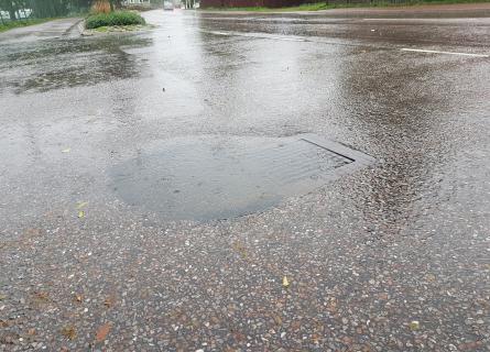 Översvämmad gatubrunn