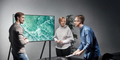 Three people working together