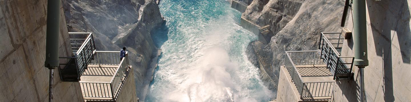 Looking down at the flowing water of the Karakaya dam spillway