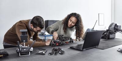 Woman and man working together on product development