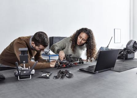 Woman and man working together on product development