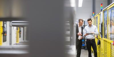 Two men in factory