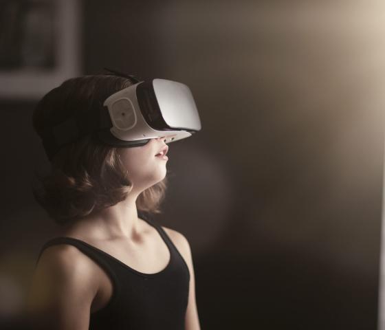 Child with VR headset
