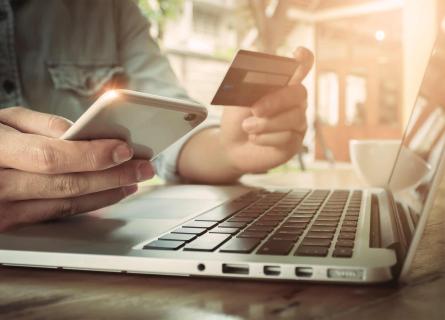 Consumer completing an online shopping transaction