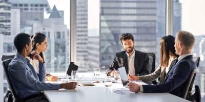 Diverse group of businesspeople discussing double materiality