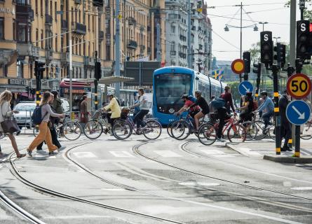 public transport and cyclist on the road