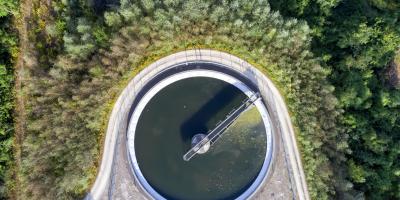 A road going around a water plant