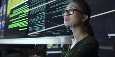 Woman looking at computer screen
