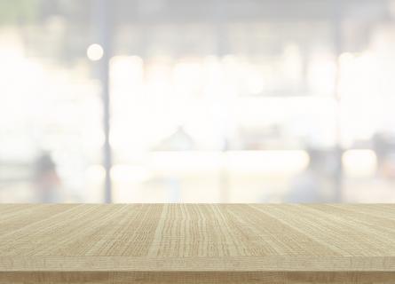 Wood based surface view with windows in background 