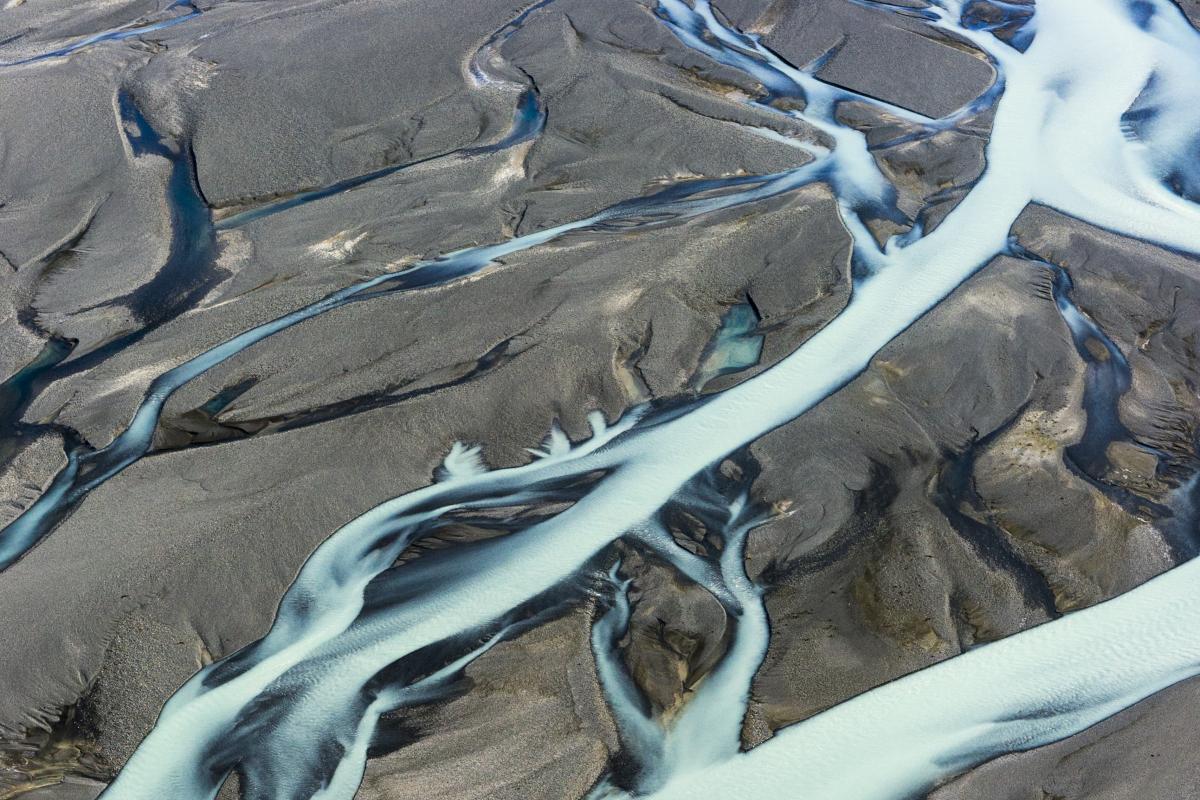 Rivers flowing from a melting glacier in Mt. Cook National Park