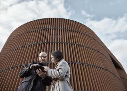 Man and Woman beside power plant in Stockholm