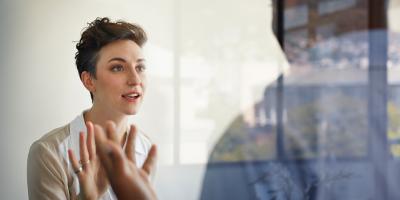 A woman talking to a person 