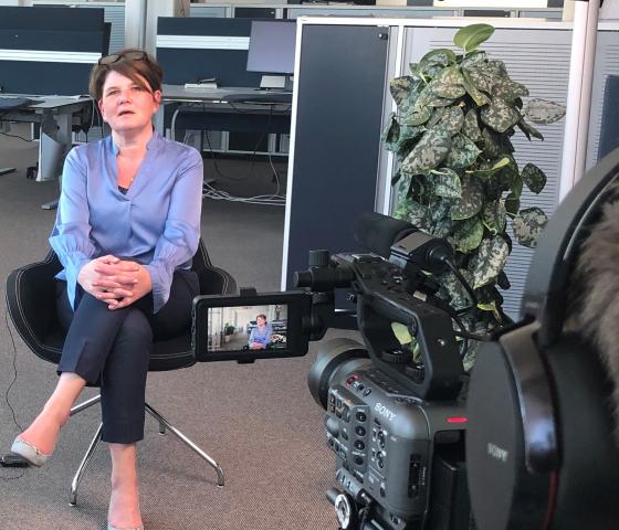 Lotta being interviewed at the office