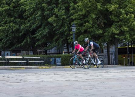 People cycling in a park