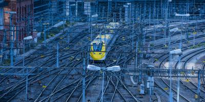 Train in a railway station / railyard