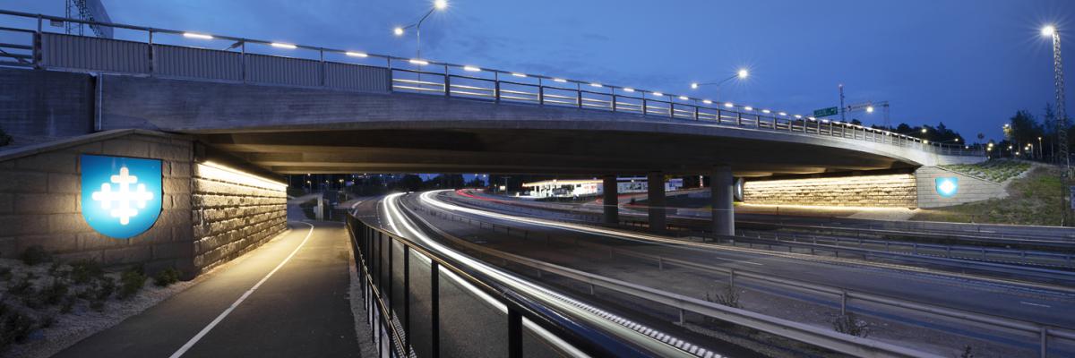 Motorway ramp and a bridge in the evening