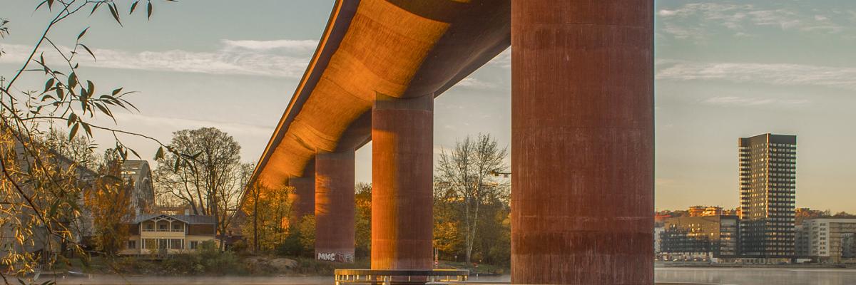 Bridge over water, city in the background