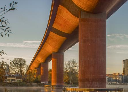Bridge over water, city in the background