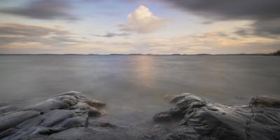 Sea and partly cloudy sky