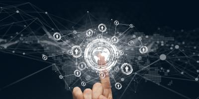 Finger points in the air with digital symbols around
