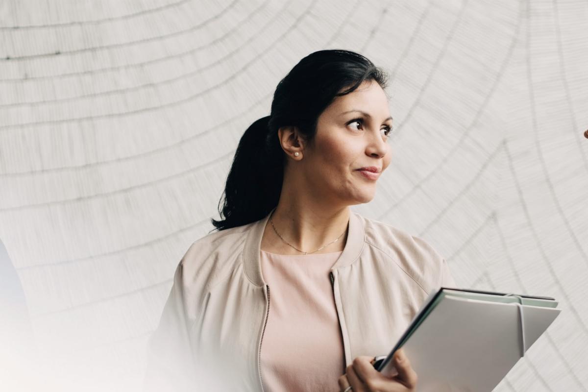Woman holding folder