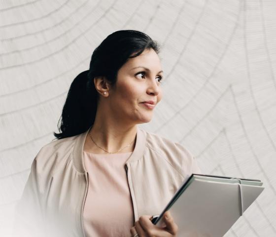 Woman with folder in hands