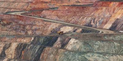 Truck carrying minerals on an open mine road