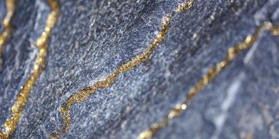 Gold encrusted grey rock
