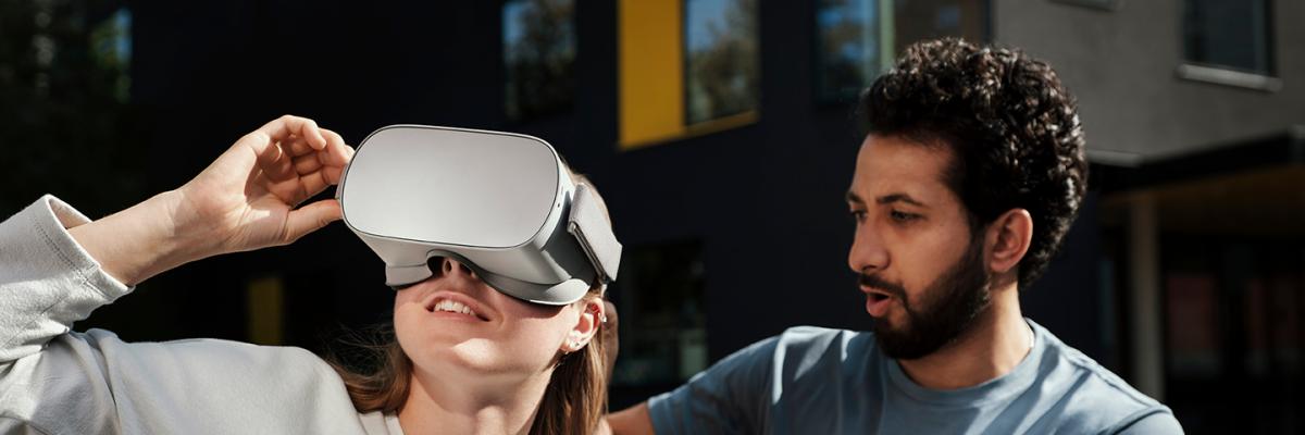 Man and woman trying VR set