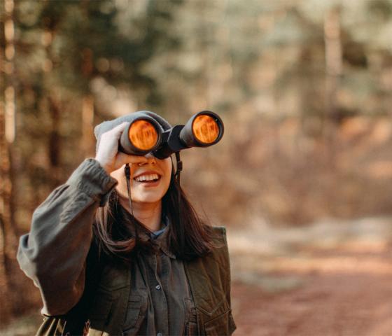Woman watching birds