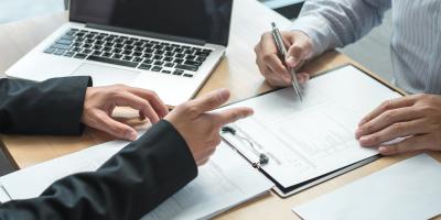 Two persons at a desk
