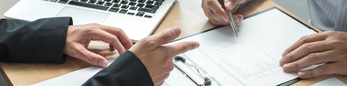 Two persons at a desk