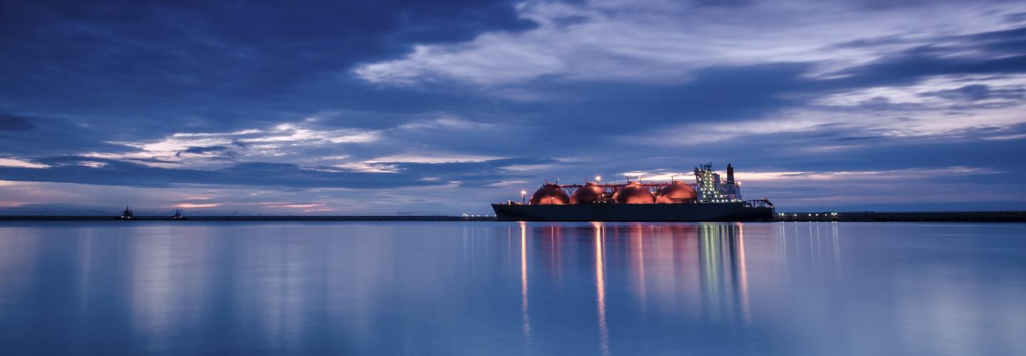 LNG tanker - sunrise over the sea gas terminal