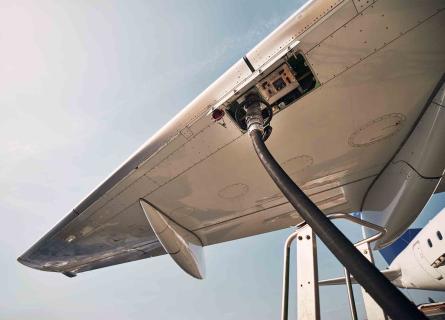 Aircraft being serviced and refuelled