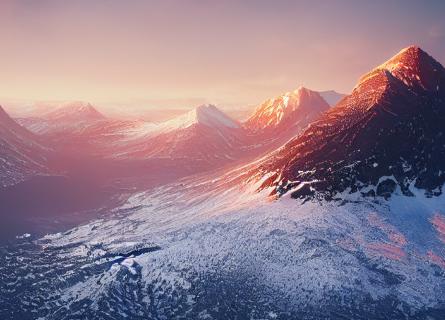 Mountains covered with snow at sunset