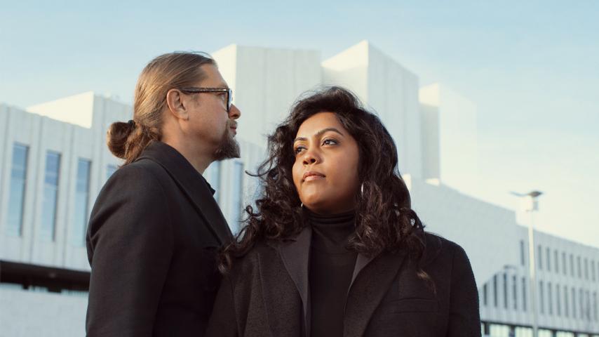 Man with glasses and woman