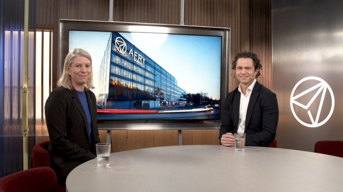 Jonas Gustavsson, CEO, and Cathrine Sandegren, Head of Communications and Brand, looking at the camera